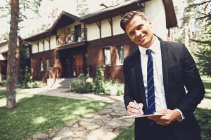 Cheerful,Confident,Young,Realtor,Standing,With,His,Notes,In,Front